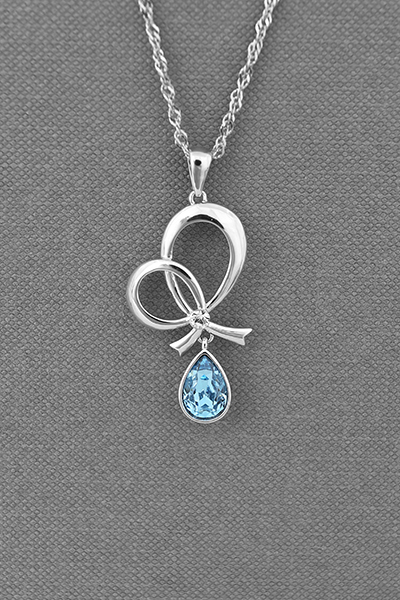 A Polished Knot Pendant With Swarovski Crystal